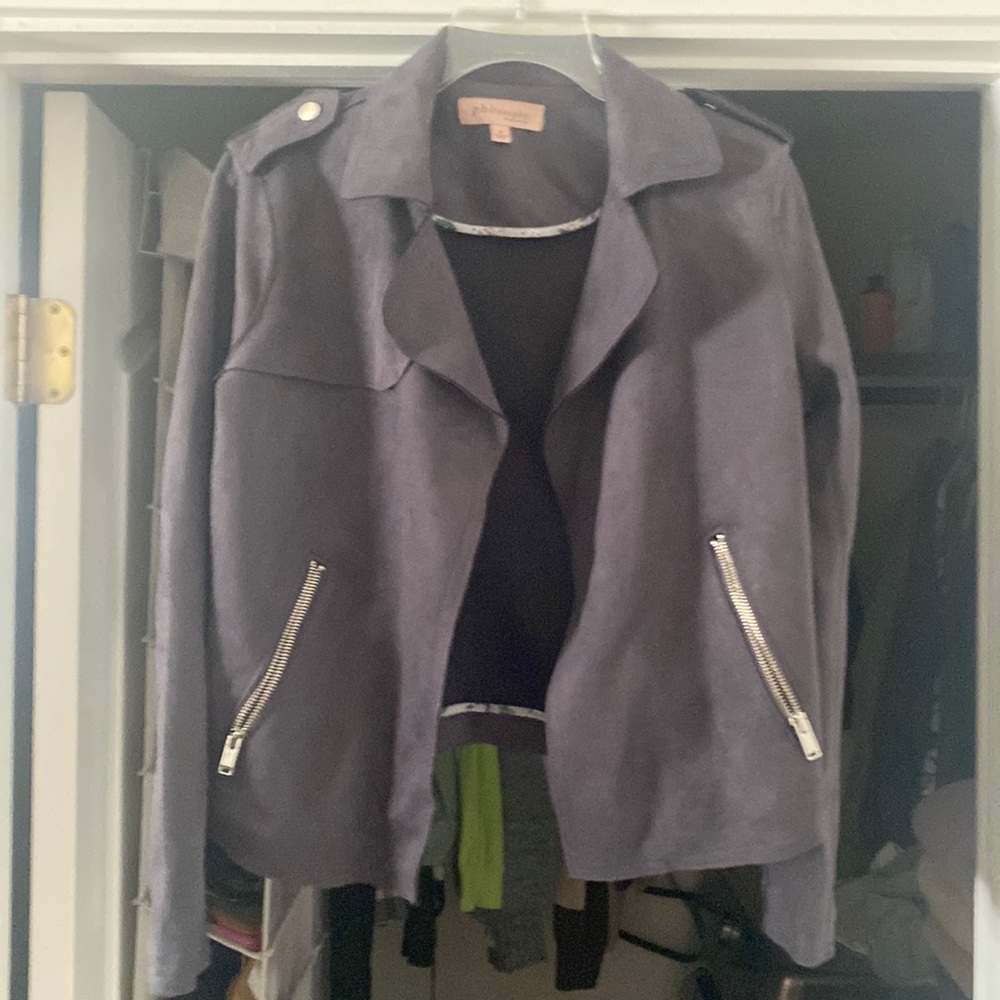 Polyester jacket. Only worn once. Size small. Blue/gray in color